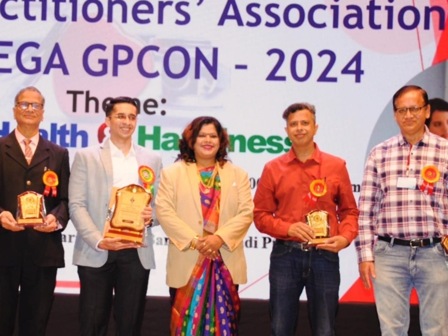 Dr. Godbole felicitated at MEGA GPCON 2024