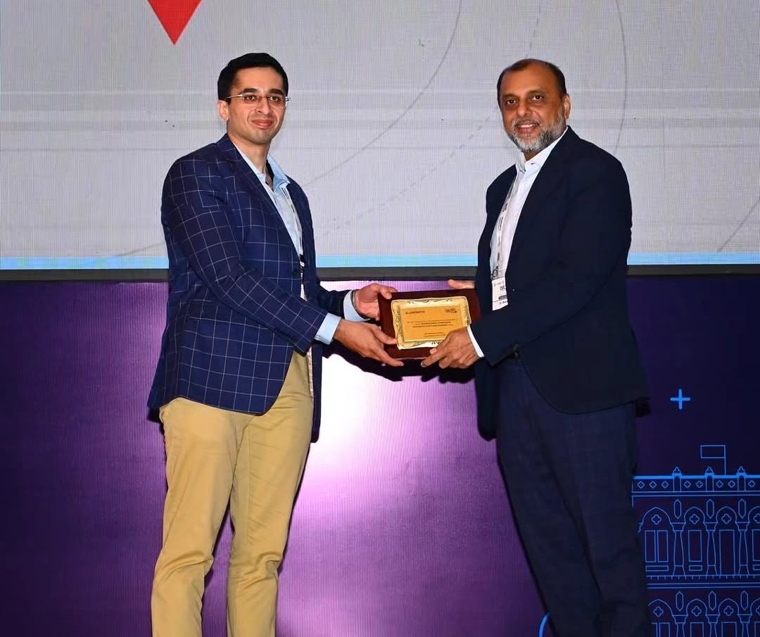 Dr. Godbole felicitating Dr. Sharan Patil (Sparsh Hospital) at ISRJR