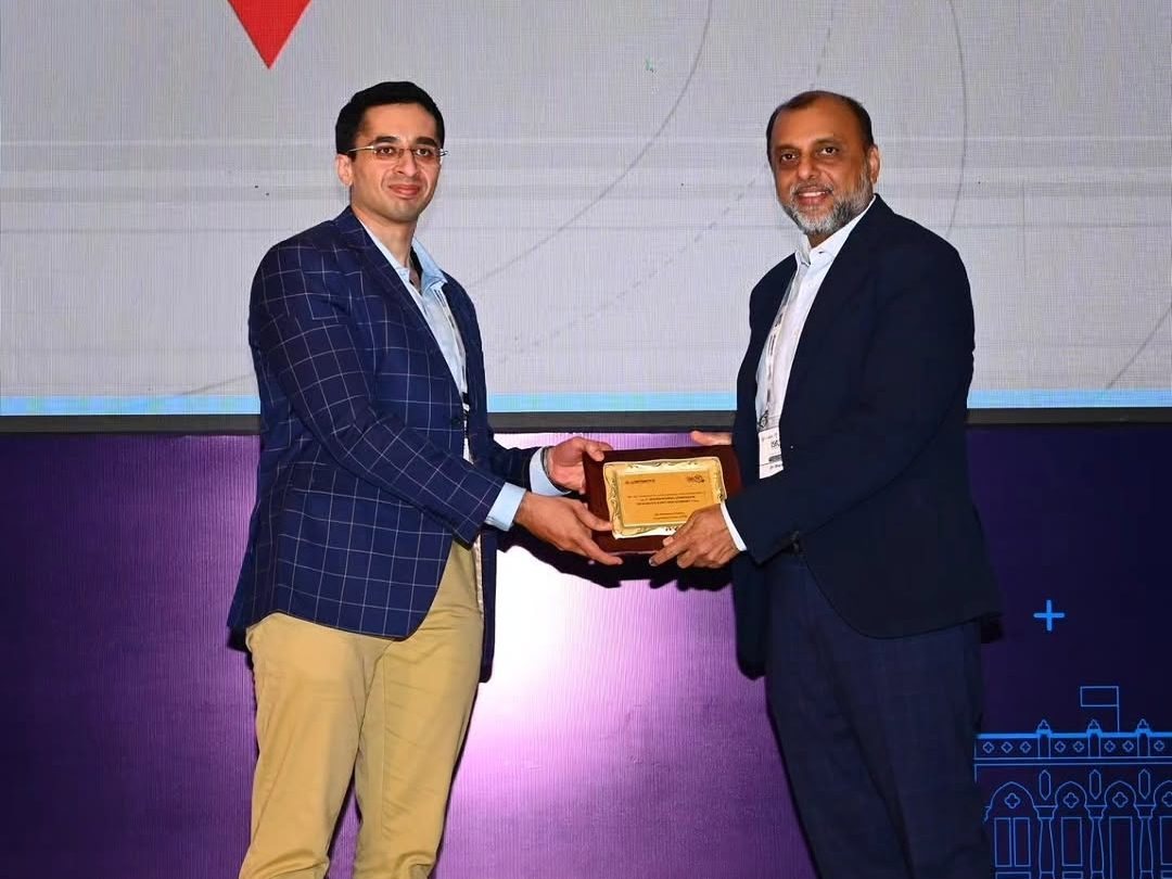 Dr. Godbole felicitating Dr. Sharan Patil (Sparsh Hospital) at ISRJR
