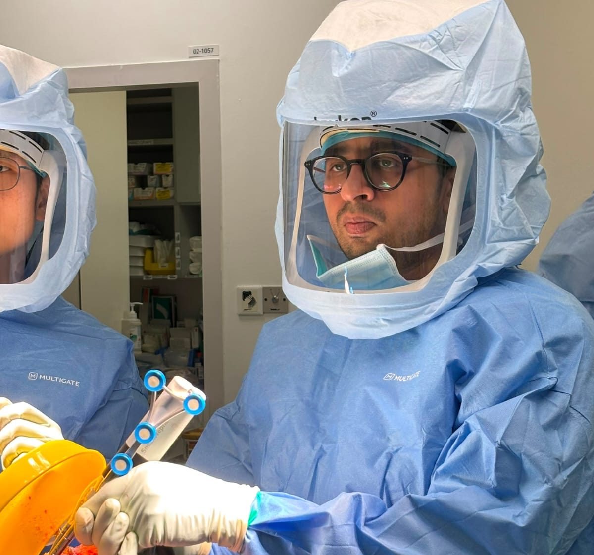 Dr. Godbole operating the CORI robotic system in theatre